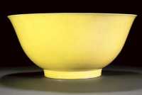 19th century A large egg-yolk yellow glazed bowl